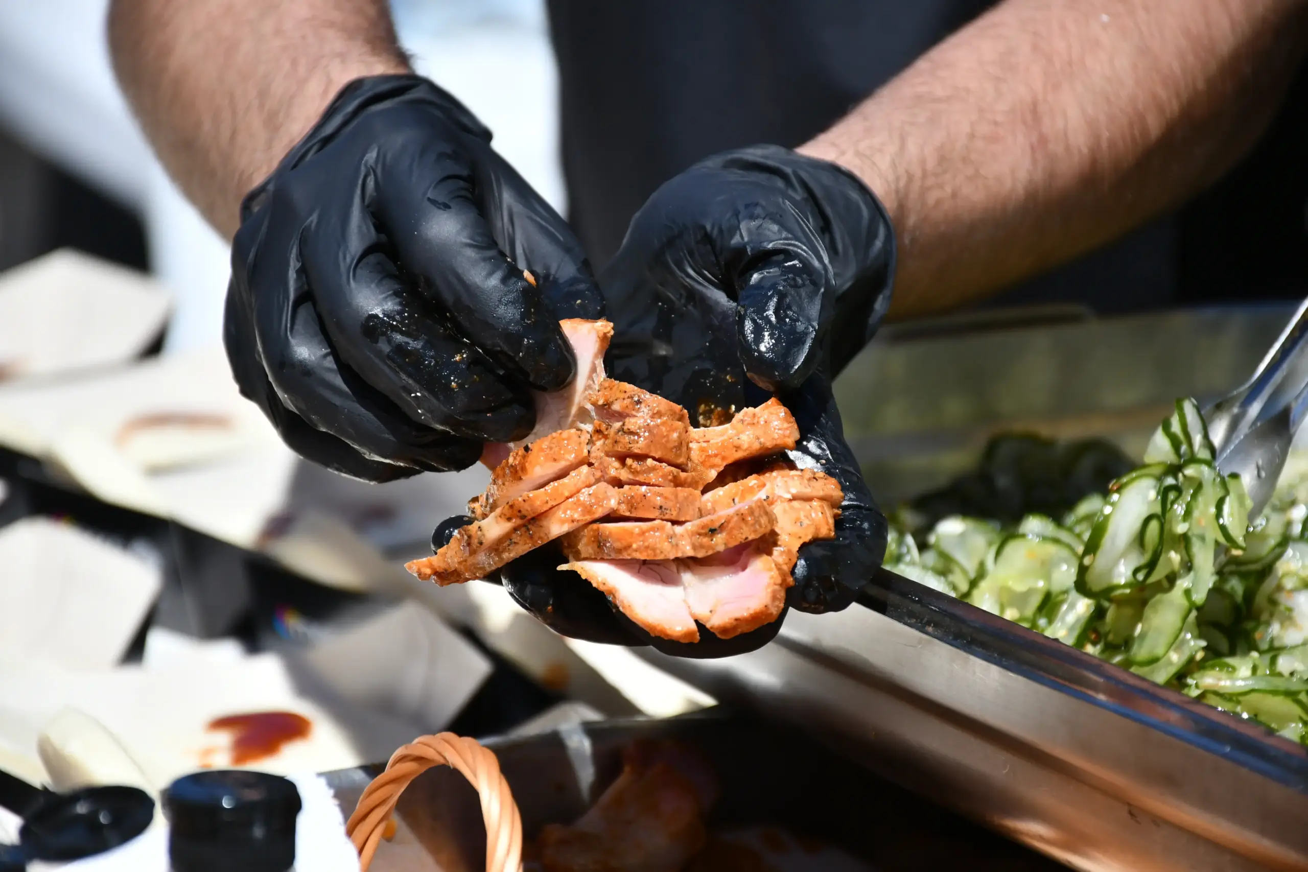 Preparo gastronômico no Meat Camp